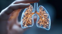 Glowing translucent human lungs with illuminated bronchial tree structure and respiratory system visualization against dark background in medical science concept.