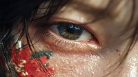 Close-up of intense green eye with dark hair strands and red paint or blood splatter on skin, creating dramatic contrast for creative visual storytelling.