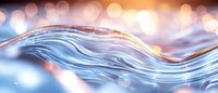 Flowing water wave with smooth curves against blurred bokeh lights background, creating serene aquatic motion in blue and golden tones.