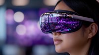 Young Asian woman wearing virtual reality headset with purple galaxy reflection in lens against blurred background with bokeh lights. Modern gaming technology.