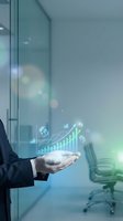 Businessman holding digital hologram displaying upward trending charts, growth graphs, and financial data analytics icons in modern office environment with glass walls.
