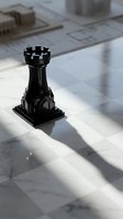 Black chess rook piece positioned on marble surface with architectural blueprints and models in background, suitable for strategy, business planning, and game design projects.