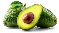 Fresh ripe avocados with one cut in half showing creamy flesh and brown pit on white background, healthy food ingredient for guacamole.