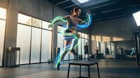 Athletic woman performing box jump exercise with dynamic motion blur trails in modern gym facility for fitness training and workout routines.
