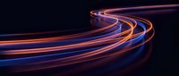 Glowing neon light trails in orange and blue curve across dark background, creating dynamic motion effect for technology, energy, and digital design projects.