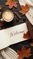 Cozy autumn flatlay with latte art coffee, open book with Welcome text, maple leaves, cinnamon sticks, and knit sweater on dark wood.