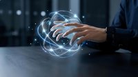 Businessman hands typing on laptop with glowing brain network hologram overlay representing artificial intelligence and digital innovation in modern office.