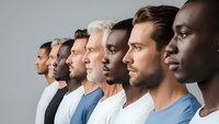 Diverse group of men in profile view showing multicultural unity and teamwork in modern workplace setting for business and social concepts.