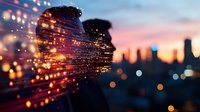 Dreamy double exposure portrait of woman silhouette with glowing light particles against urban sunset skyline creating magical atmospheric effect.