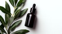 Black glass dropper bottle with green olive leaves on white background, natural cosmetic packaging mockup for skincare, aromatherapy and wellness products.
