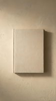 Closed blank hardcover book with cream linen cover mounted on textured beige wall, casting soft shadow. Suitable for publishing, branding, and editorial mockup designs.