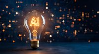 Glowing light bulb with AI text inside filament against bokeh lights background representing artificial intelligence innovation and technology concepts.