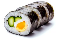 Fresh sushi roll with cucumber and egg yolk wrapped in nori seaweed and white rice, isolated on white background for menu design and food advertising.