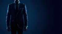 Faceless male professional wearing dark formal suit and tie stands against blue background, isolated for corporate and business design applications.