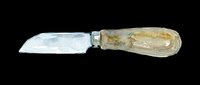 Vintage putty knife with translucent horn handle isolated on transparent background, ready for clipart, print-on-demand designs, t-shirt graphics, stickers, and sublimation projects.