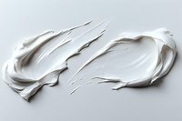 White creamy paint strokes with dynamic texture and flowing movement on light background, showing thick impasto technique and artistic expression.
