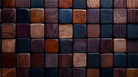 Textured wooden mosaic of dark brown, black and copper colored square blocks with carved linear patterns creates modern geometric wall decor background.