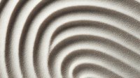 Minimalist zen sand pattern with concentric circles creating peaceful ripple effect in neutral beige tones, suitable for wellness and meditation designs.