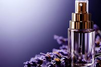 Luxury perfume bottle with golden cap surrounded by purple flowers on elegant gradient background for cosmetics and fragrance advertising.