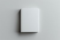 White blank hardcover book mockup on gray background for branding and publishing projects.