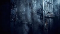 Dark atmospheric concrete wall with dramatic smoke and moody lighting creating mysterious industrial ambiance for horror and thriller projects.