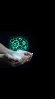 Human hands holding glowing green holographic gear mechanism with connected network nodes on dark background for technology and innovation concepts.