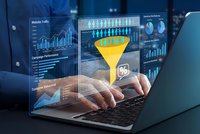 Business professional analyzing data conversion funnel with holographic analytics dashboard on laptop for marketing optimization and performance tracking.