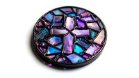 Stained glass mosaic pattern in vibrant blue, purple, and pink tones with metallic frame creates mystical church window effect, isolated on white background.