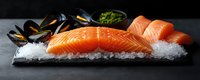 Fresh raw salmon fillet and mussels on crushed ice against dark background, with herbs and seafood composition for restaurant menu presentation.