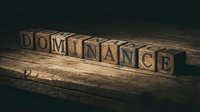 Wooden letter blocks spelling DOMINANCE on rustic table surface with dramatic lighting for business and leadership concepts.