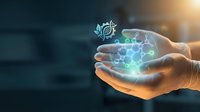 Hands holding glowing digital network with gear icon representing technology innovation and connectivity solutions for business development.