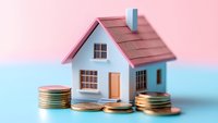 Small model house with stacks of coins on pastel pink and blue background, representing real estate investment, mortgage, and property finance concepts.