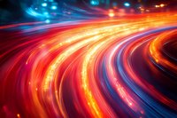 Dynamic light trails create vibrant energy waves with flowing motion blur effects in electric blue and fiery orange colors for modern digital backgrounds.
