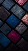 Abstract geometric pattern of textured squares in dark blue, pink, and black tones creating modern mosaic composition with dramatic lighting and shadowing effects.