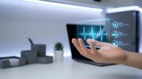 Hand interacting with futuristic holographic medical interface displaying heartbeat pulse and health icons in modern smart home environment for healthcare technology.