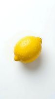 Fresh yellow lemon with textured peel isolated on white background for culinary and health designs.