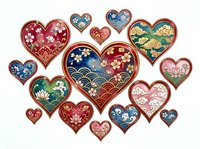 Ornate decorative hearts with intricate floral and geometric patterns in gold, red, blue, and teal, isolated on white background, suitable for Valentine designs, greeting cards, and festive artwork.