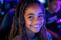 Smiling African American girl with braided hair wearing gaming headset illuminated by vibrant neon purple and blue lights in esports environment.