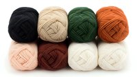 Soft cotton yarn balls in autumn and neutral colors arranged in two rows on white background, ready for knitting and crochet projects.
