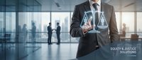 Professional businessman in suit holding glowing digital justice scales icon in modern office environment representing legal technology and law firm services.