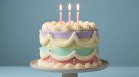 Elegant pastel birthday cake with decorative frosting swirls and three lit candles on blue background for celebration and party occasions.