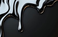 Glossy black liquid with metallic silver reflections creating abstract flowing curves and waves against dark background, suitable for luxury product advertising.