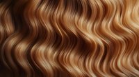 Wavy blonde and brown hair texture with natural highlights and lowlights creating flowing pattern. Seamless background for beauty and fashion designs.