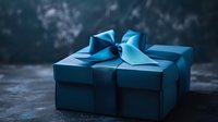Elegant blue gift box with satin ribbon bow on dark background, perfect for luxury presents and special occasions. Holiday celebration concept for design use.