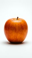 Fresh red apple with stem isolated on white background, ready for food and nutrition design projects.