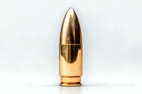 Single golden bullet cartridge with copper base and brass casing isolated on white background, showing detailed metallic texture and reflection.