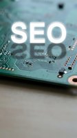SEO text overlay on green circuit board with electronic components and microchips for digital marketing and search engine optimization concepts.