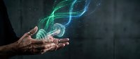 Scientist hand holding glowing DNA helix with digital particles, representing genetic research, biotechnology, and molecular science innovation.