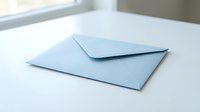 Light blue closed envelope and open envelope on white surface with window background, suitable for mail, correspondence, and business communication designs.