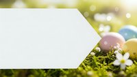 Blank white card with colorful Easter eggs and spring flowers on green grass with warm sunlight for holiday greeting cards and seasonal marketing.